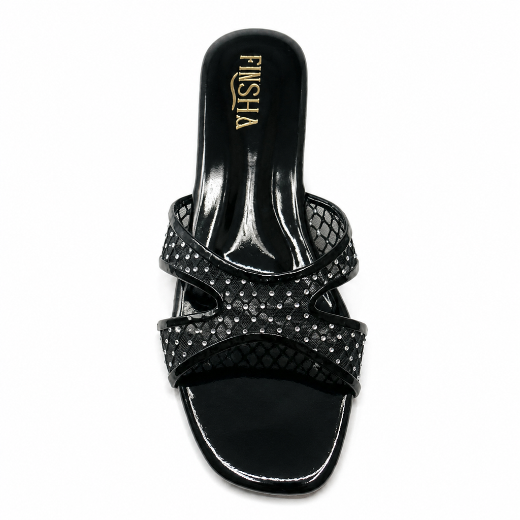 Black cozy flat slipper from Finsha Shoes with a soft, plush interior and simple slip-on design.