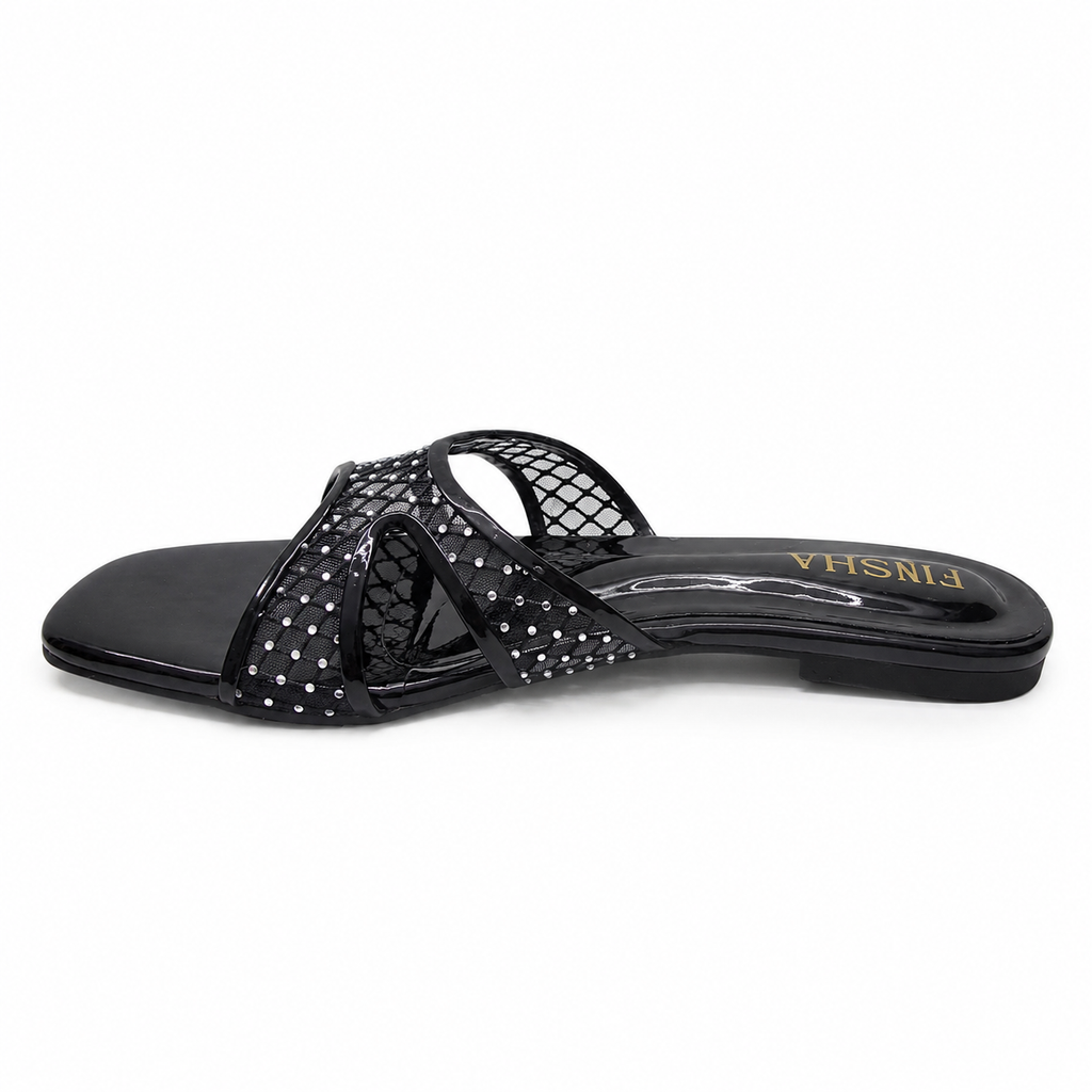 Black Cozy Flat Slipper by Finsha Shoes featuring soft fabric and comfortable slip-on design for indoor wear.