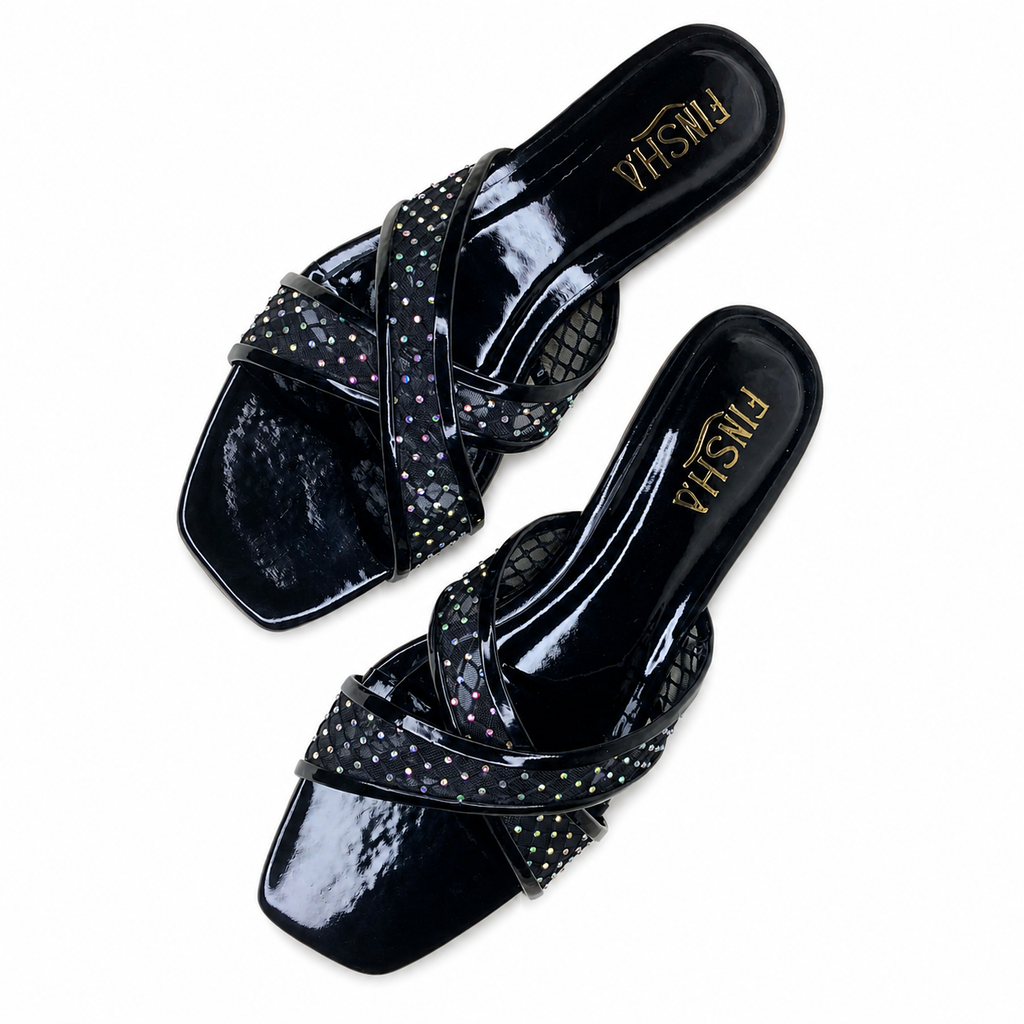Black Rozy flat slipper by Finsha Shoes, featuring a cozy, comfortable design with soft fabric and slip-on style.