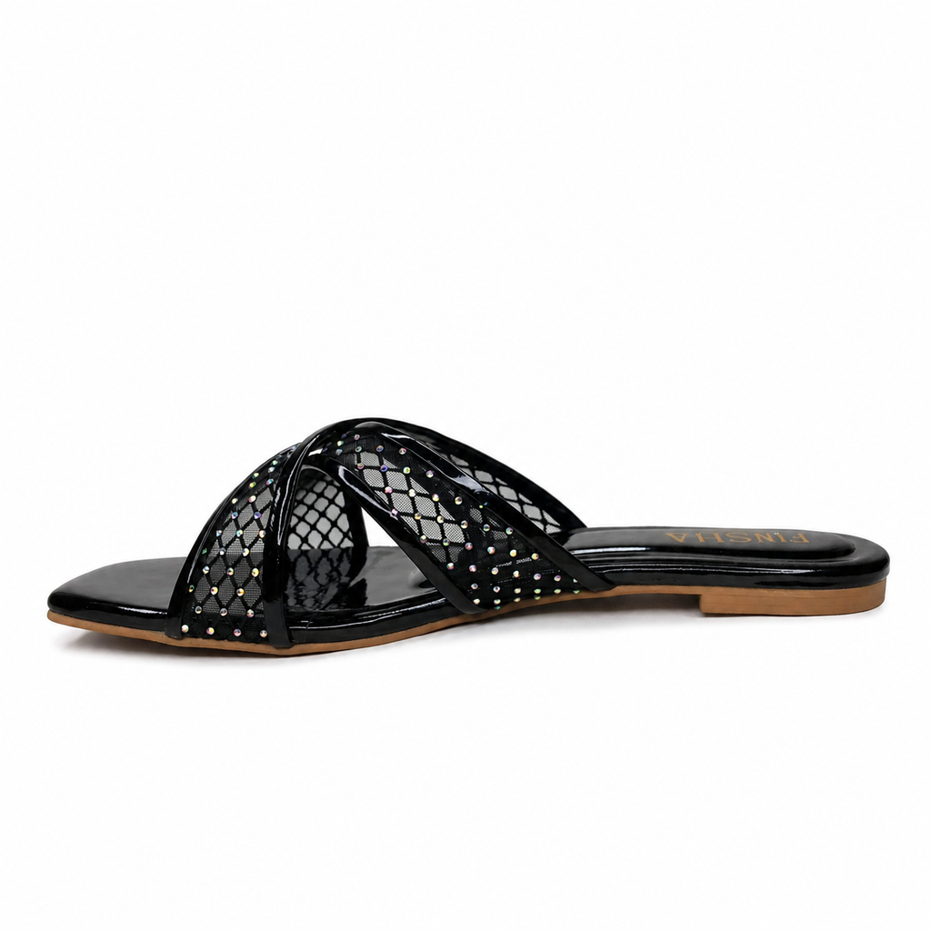 Black Rozy flat slippers by Finsha Shoes with a cozy design, perfect for comfortable casual wear.