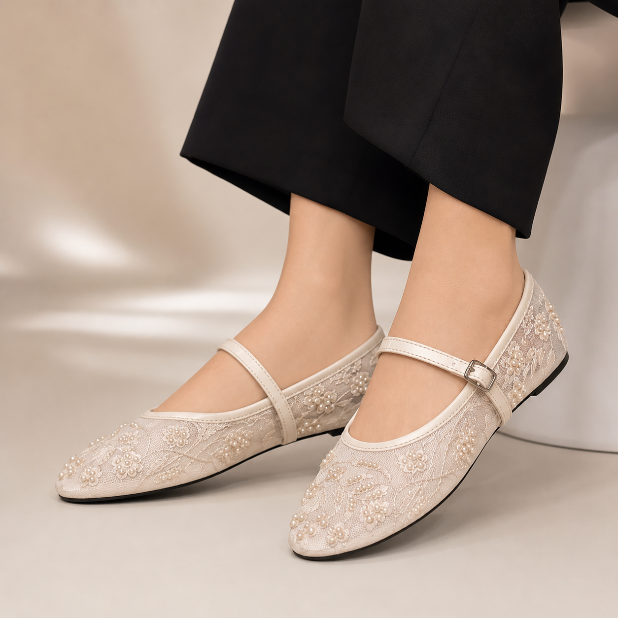 Black embroidered mule shoes by Finsha Shoes, stylish slip-on pumps with intricate embroidery, perfect for casual or dressy outfits.