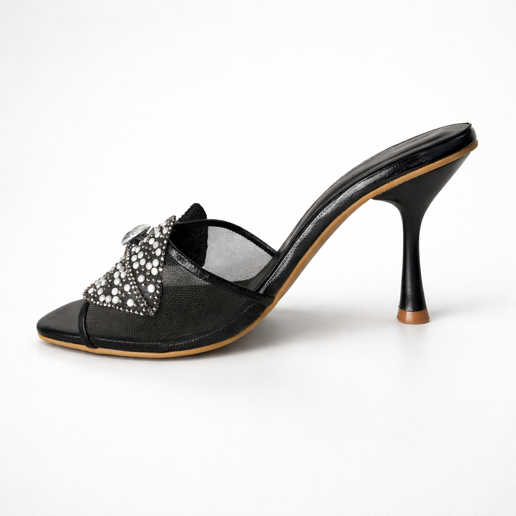 Silver wedding shoes by Finsha Shoes featuring flower festive design and elegant heels.