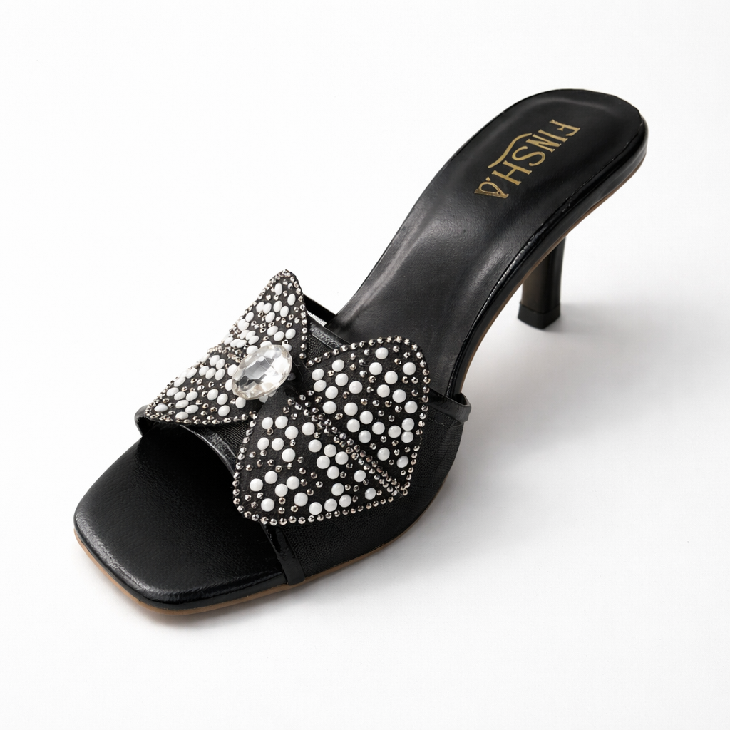 Silver wedding shoes with flower embellishments by Finsha Shoes, featuring festive heel design and elegant style.