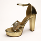 Gold LYNIX 5-inch platform heel by Finsha Shoes, featuring a sleek design and sturdy platform sole.
