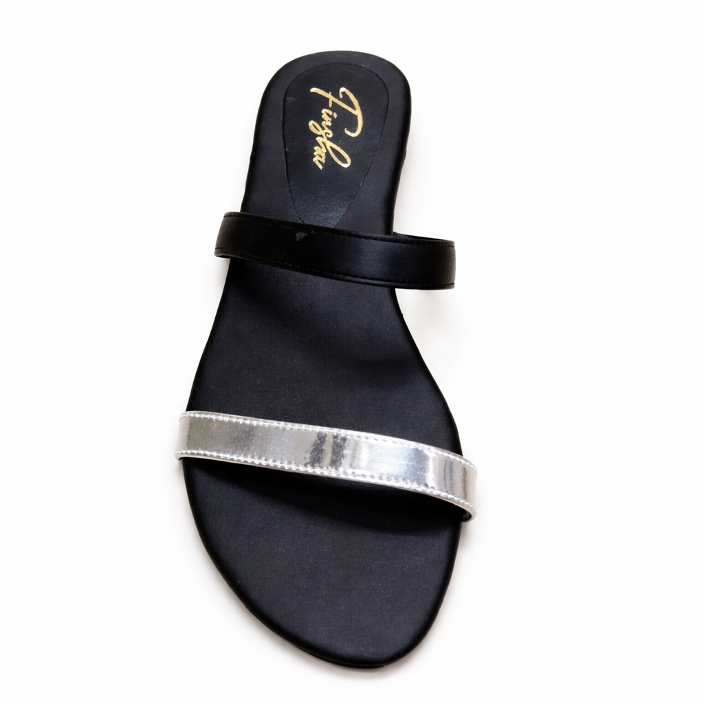 Black flat slip-on slipper from Finsha Shoes, featuring a comfortable design and simple style for everyday wear.