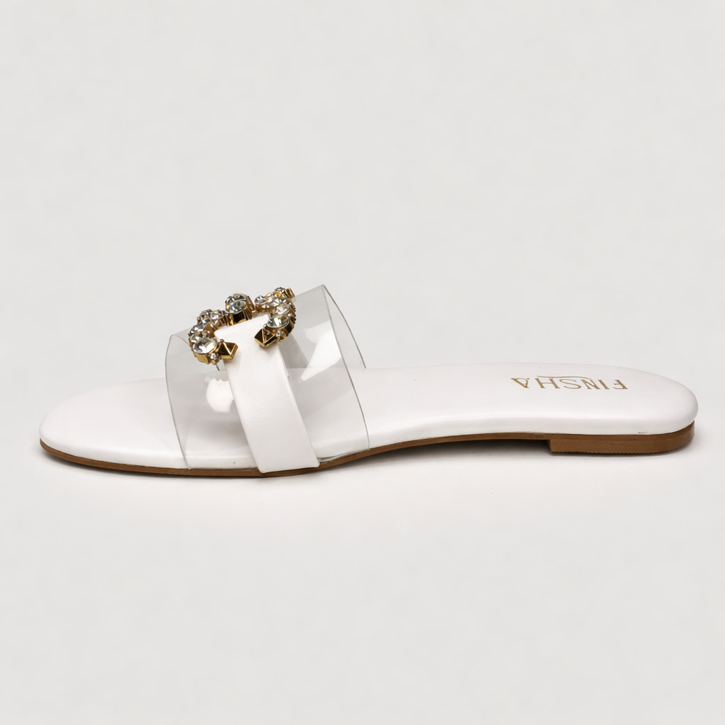 White WILY flat slipper by Finsha Shoes with a simple slip-on design and comfortable flat sole.